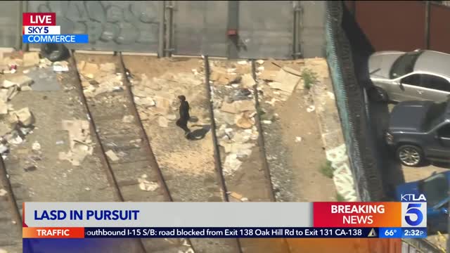 Man tries to jump on train during pursuit