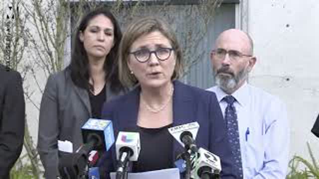 Coronavirus expert warns people not to touch their mouths but licks her finger