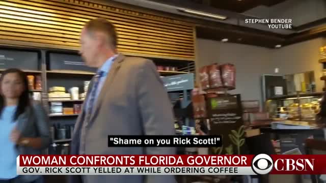 Woman reads the riot act to Fla. Gov. Rick Scott at coffee stop