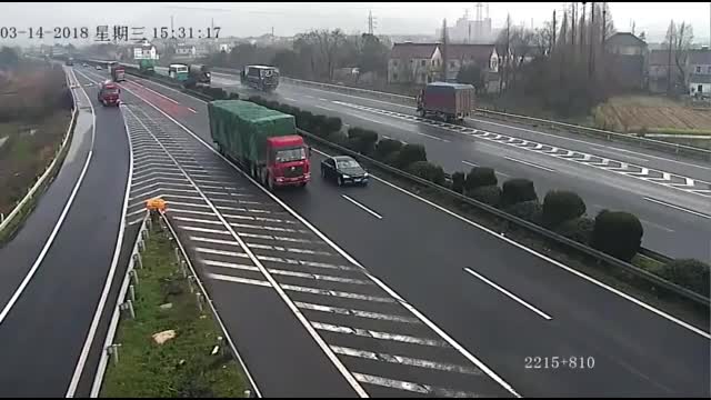 Reckless Driver Missed Exit Causes Two Semi Trucks to Crash Spectacularly