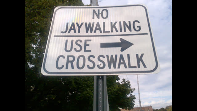 Why Crossing The Street Illegally Is Called Jaywalking