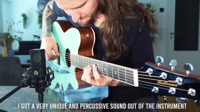 Playing guitar underwater actually sounds HEAVENLY