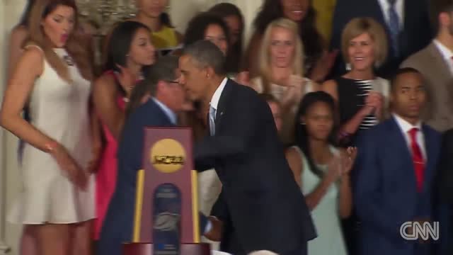 Obama helps UConn player who fell off stage