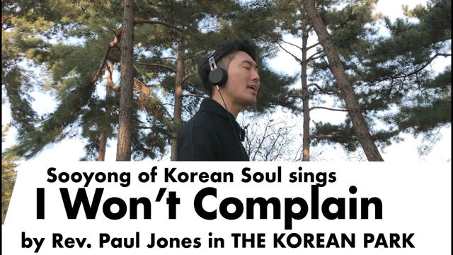 Sooyong sings "I Won't Complain" in the park.