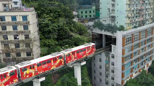 This Chinese Train Runs Through a Full Apartment Building Every 2 Minutes