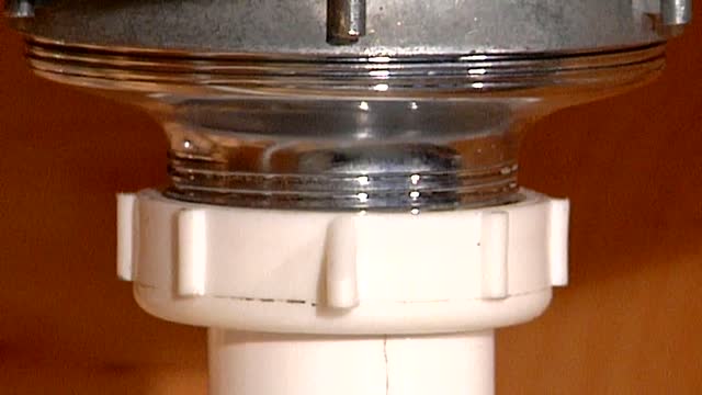 How to Work a Snake for a Clog in a Sink : Home Sweet Home Repair